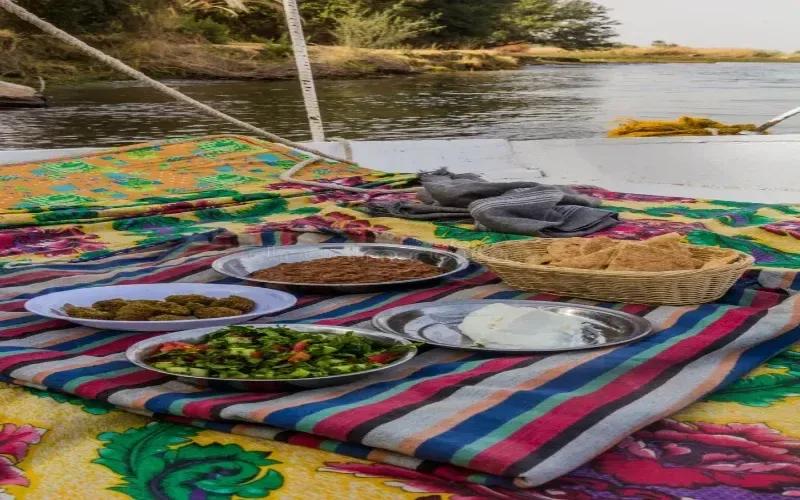 Lunch on the Nile — traditional Egyptian mezze served on the lotus boat return from Dendera